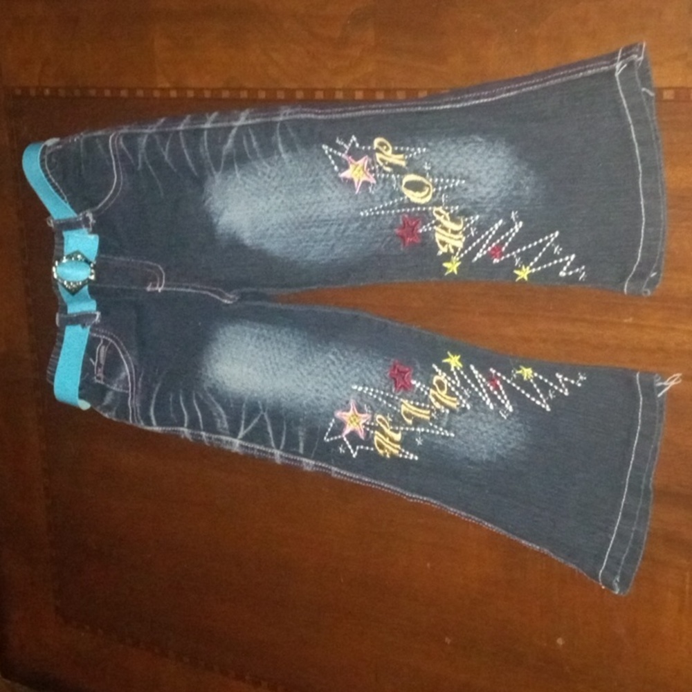 NWOT girl 6 jeans, embroidered design on legs